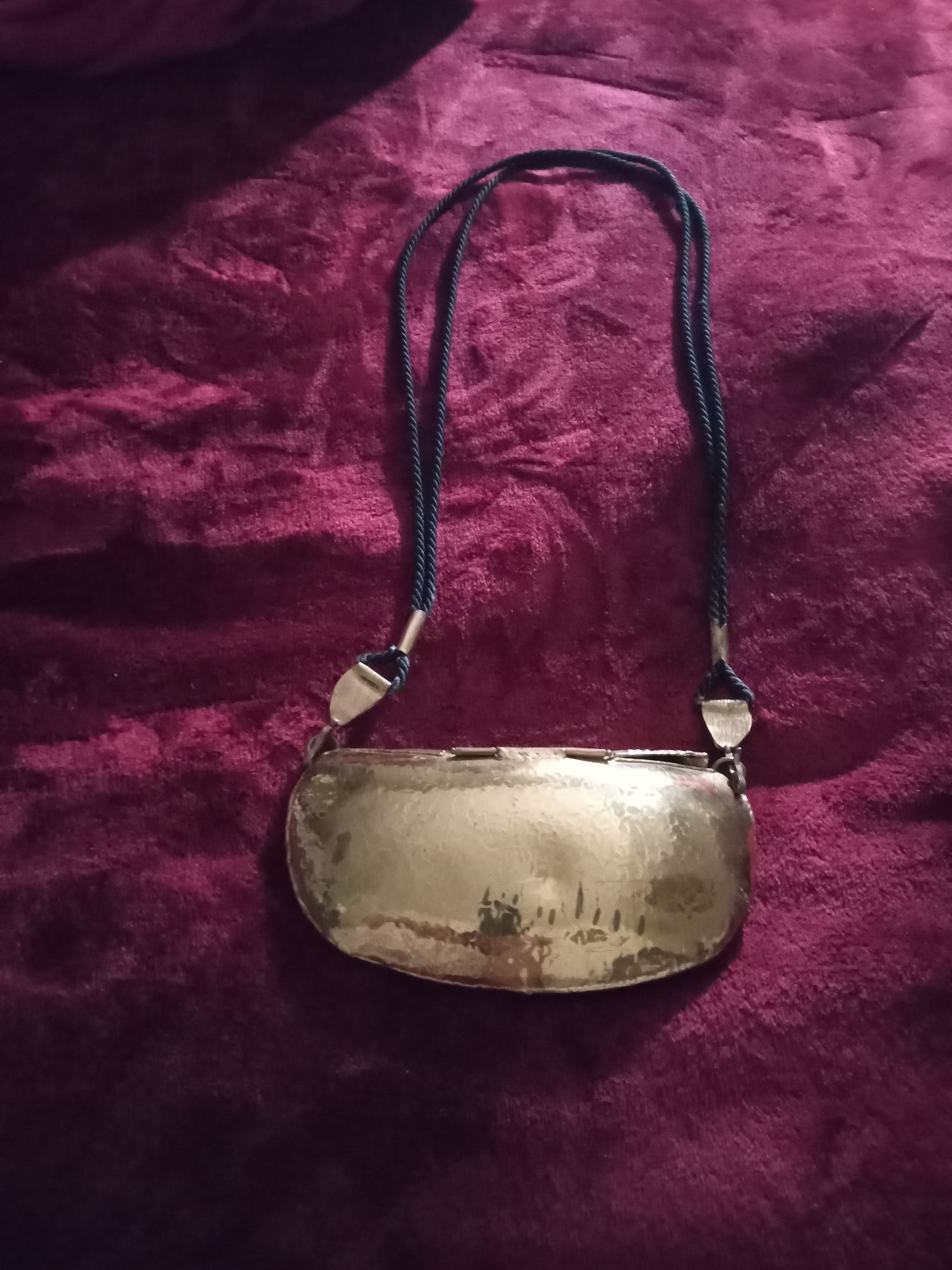 Brass cross over purse with black roped straps