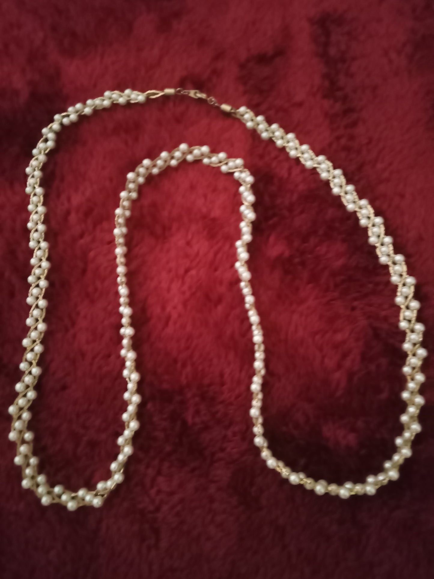 Tripled pearl beaded necklace accented in gold