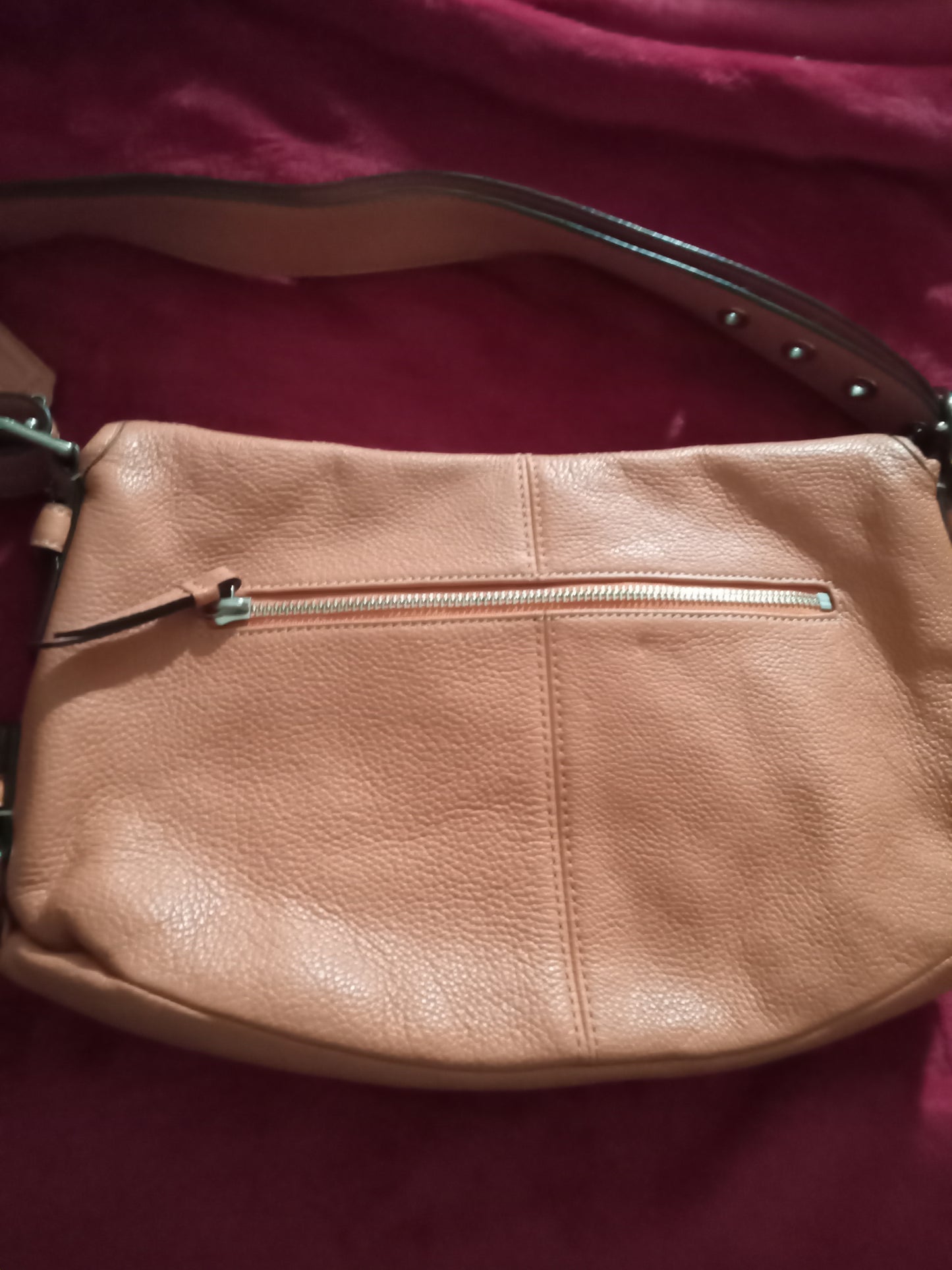 Rust color coach bag