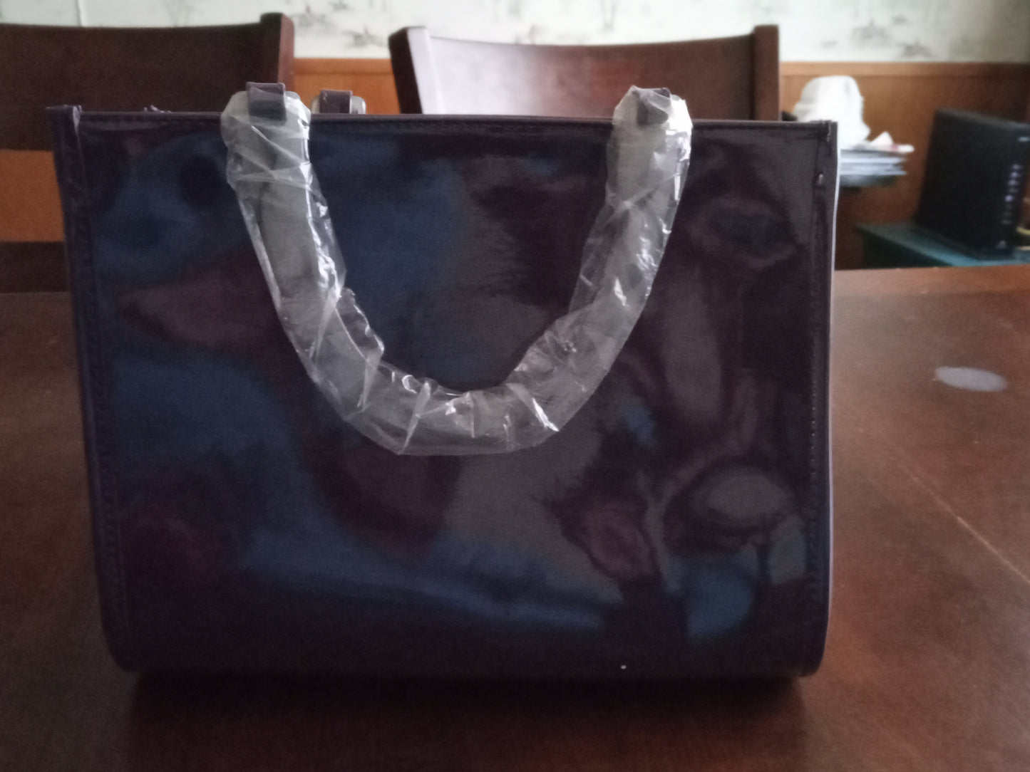 Dark purple handbag